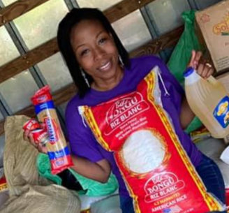 a volunteer holding a food item